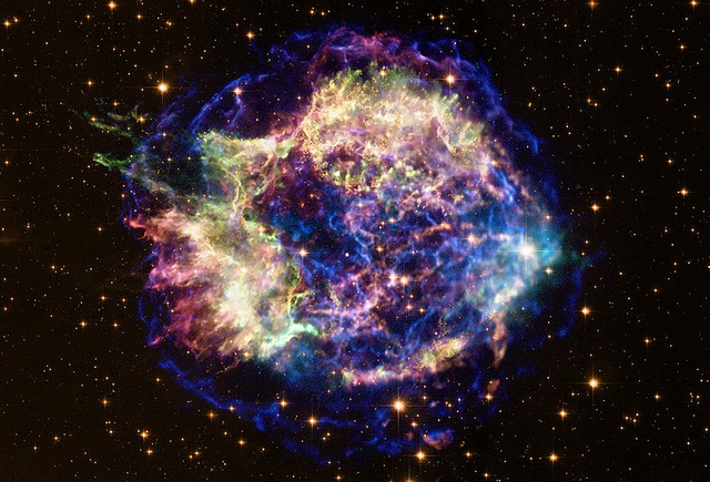 Supernova Remnant Cassiopeia A (NASA, Chandra, Hubble, 02/23/11), CC by-nc NASA's Marshall Space Flight Center
